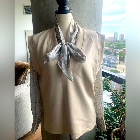 B. Young beige, lightweight vest. Only worn once! - Picture 2 of 7